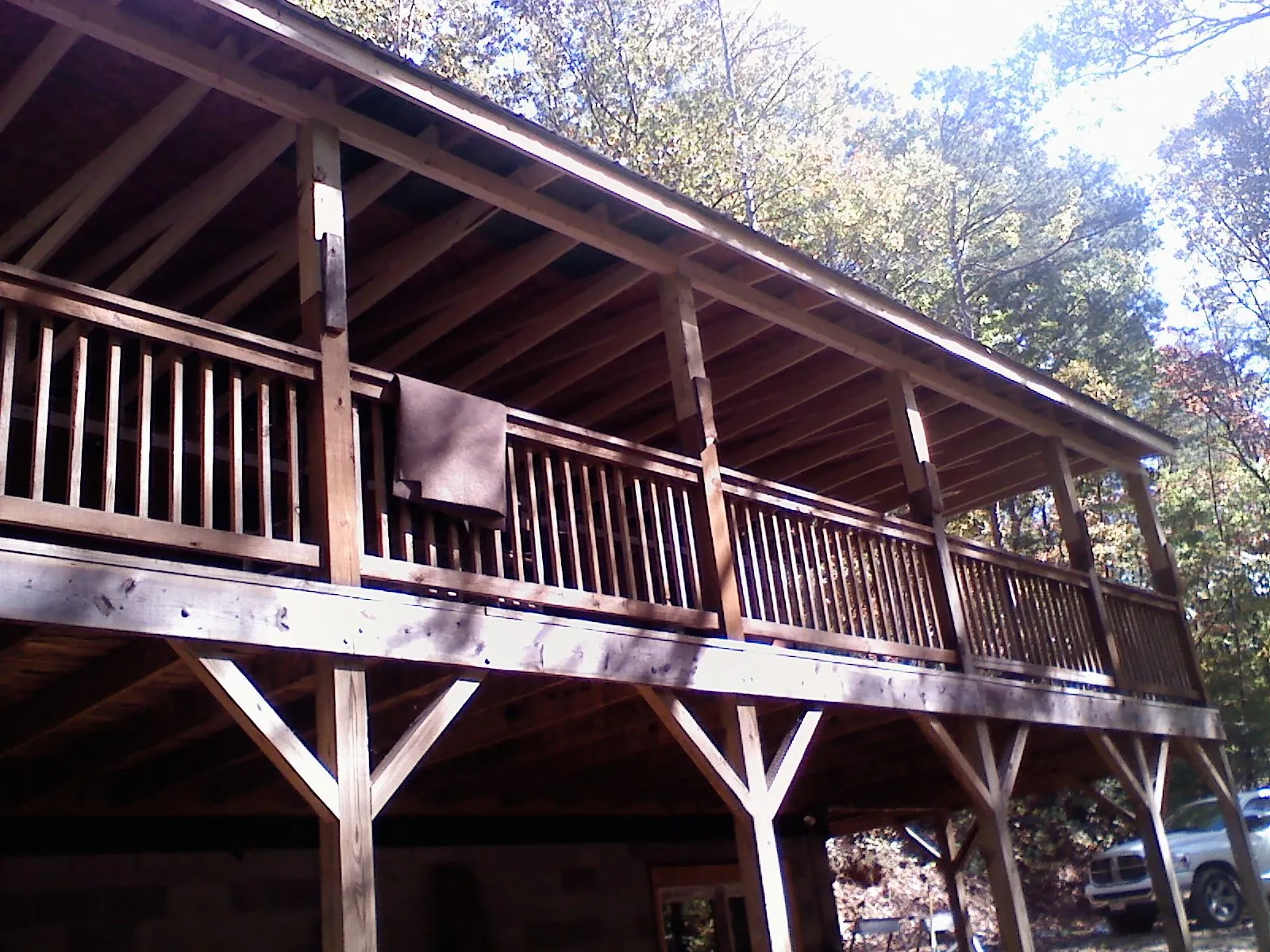 Timber framing under a new elevated porch and deck — Roof Leak Repair in Usk by Roofing Brothers